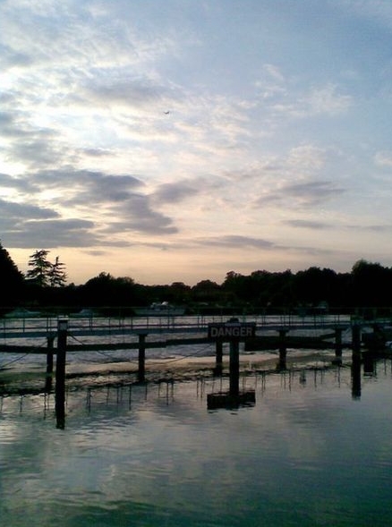 A breath of wind and just the rush of the water over the weir